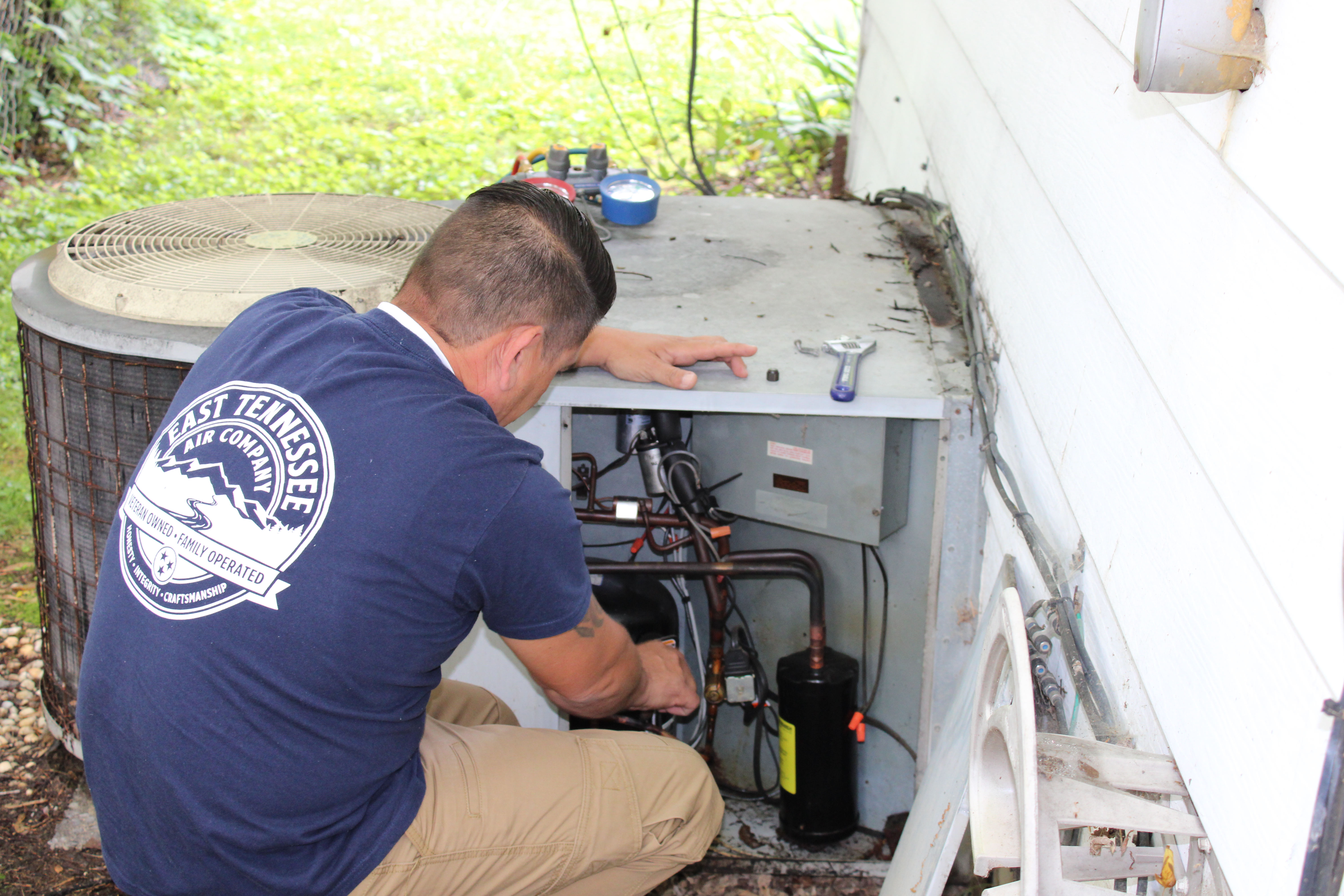 East Tennessee Air Company technician on a residential HVAC job in Knoxville